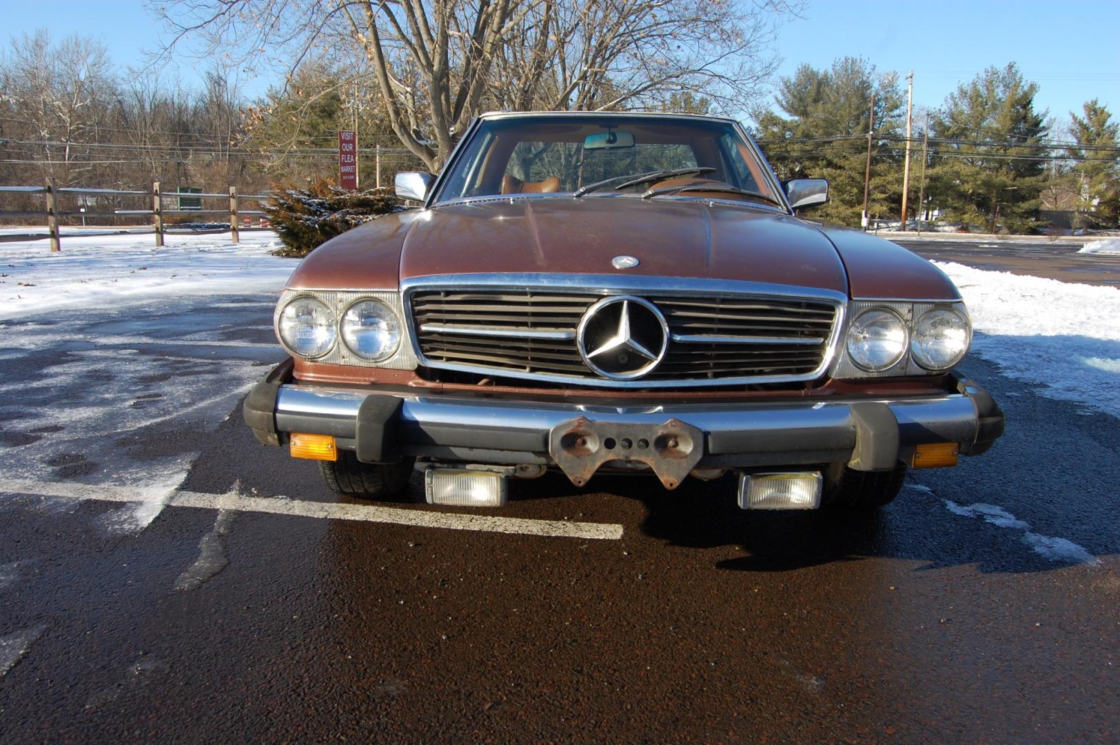 1976 Brown /Brown Leather Mercedes-Benz 450SL (10704412030) with an 4.5L V8 engine, Automatic transmission, located at 6528 Lower York Road, New Hope, PA, 18938, (215) 862-9555, 40.358707, -74.977882 - Here we have a nice 1976 Mercedes 450SL convertible with a 4.5L V8 engine putting power to the rear wheels via an automatic transmission. Some options on this vehicle include brown leather, wood trim, power windows, removable hard top, heat, A/C, AM/FM radio, cruise control, wood steering wheel, 14 - Photo#7